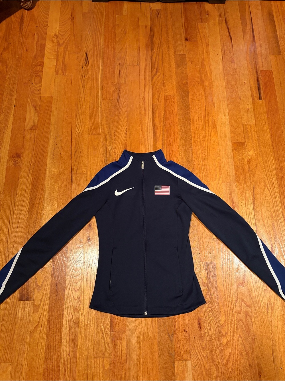 Nike Navy Women's Full-Zip Podium Jacket with White Trim from team USA 2016 kit